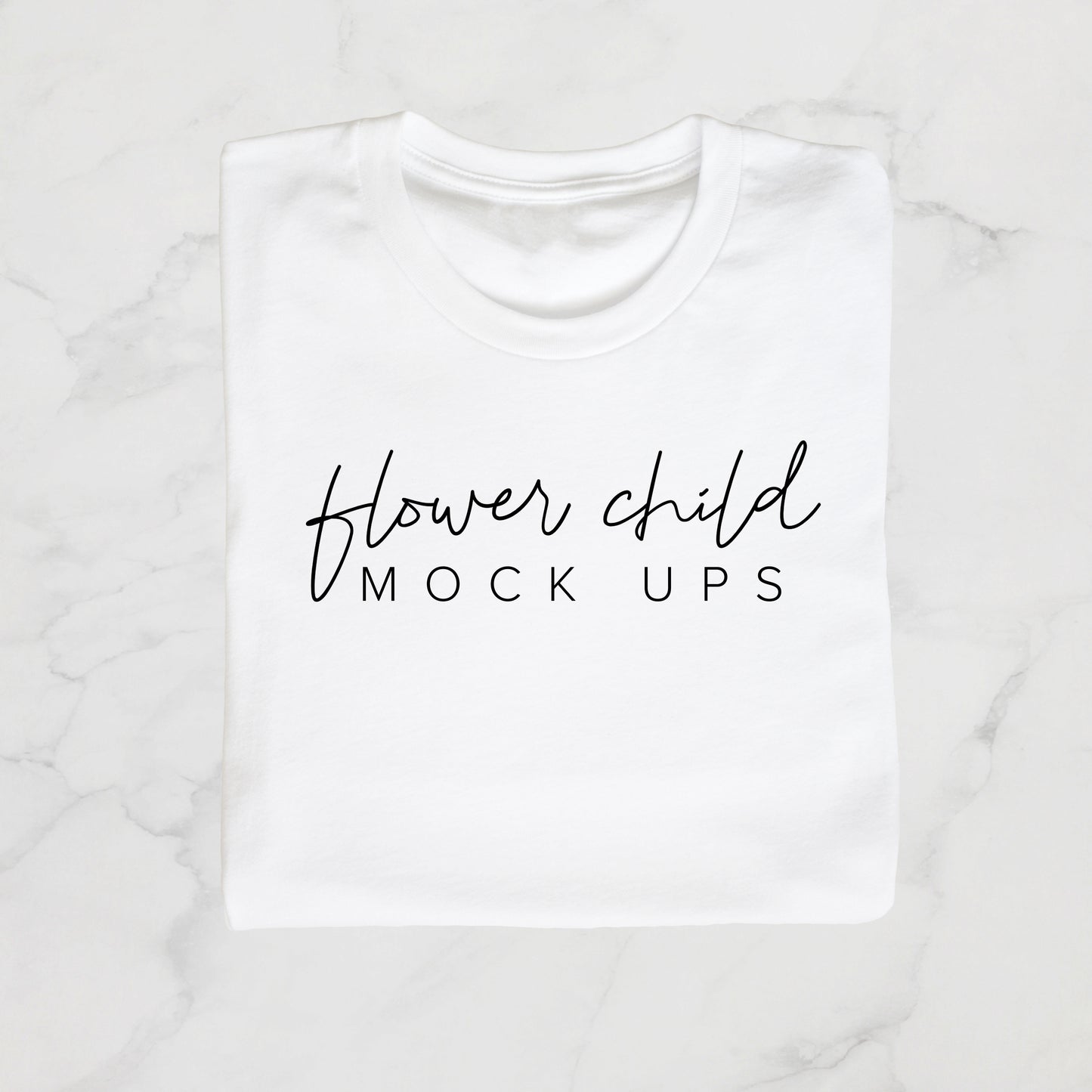 White Tagless Tshirt Folded Marble Background